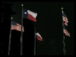 Flags flying above the food court outside the Cotton Bowl